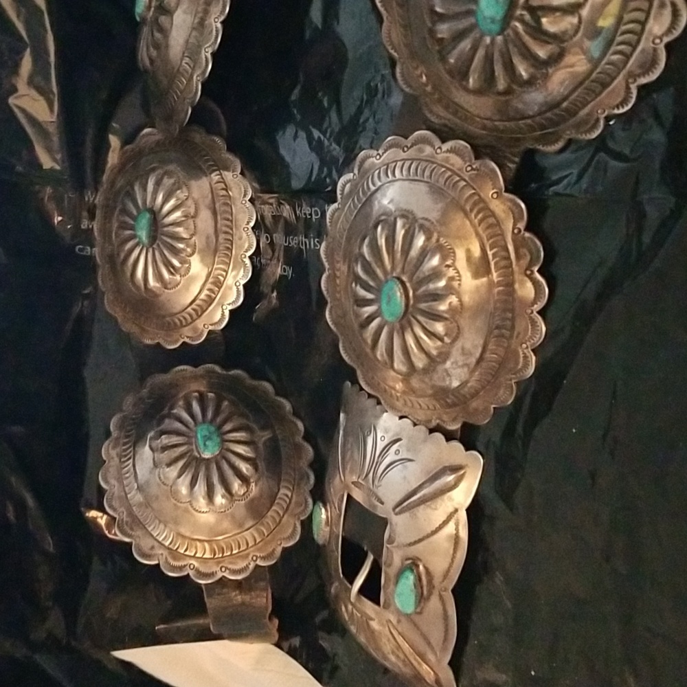 Navajo concho belt with detailed buckle it was made before they signed their wor